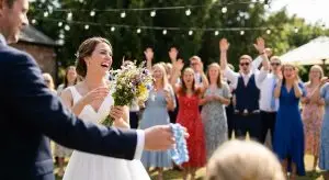 Best garter and bouquet toss songs for receptions